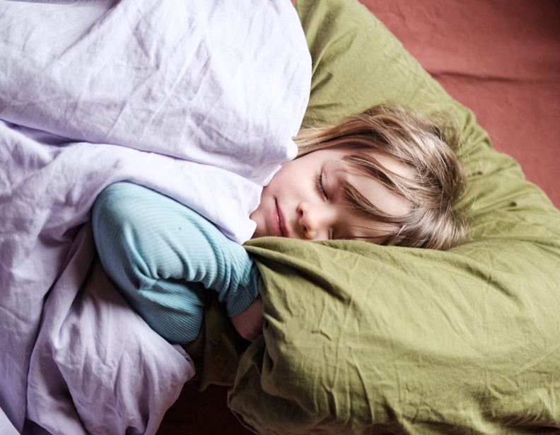 Barn i sengetøy fra Myyk